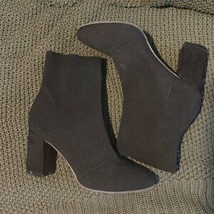 A pair of size 7 black booties